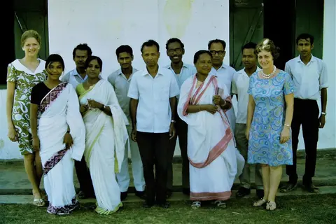 Headmaster Lalbulliana Rokhum( white shirt in centre)  From left- Elizabeth Jones, Syamali, Ronen, Puspa, Surajit, Bholanath De, Lalbul, Subhashstri, Subhash, ? , Dawn Fox, ? .